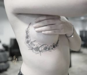 Benson Tattoo Studio Flower Breast Tattoo