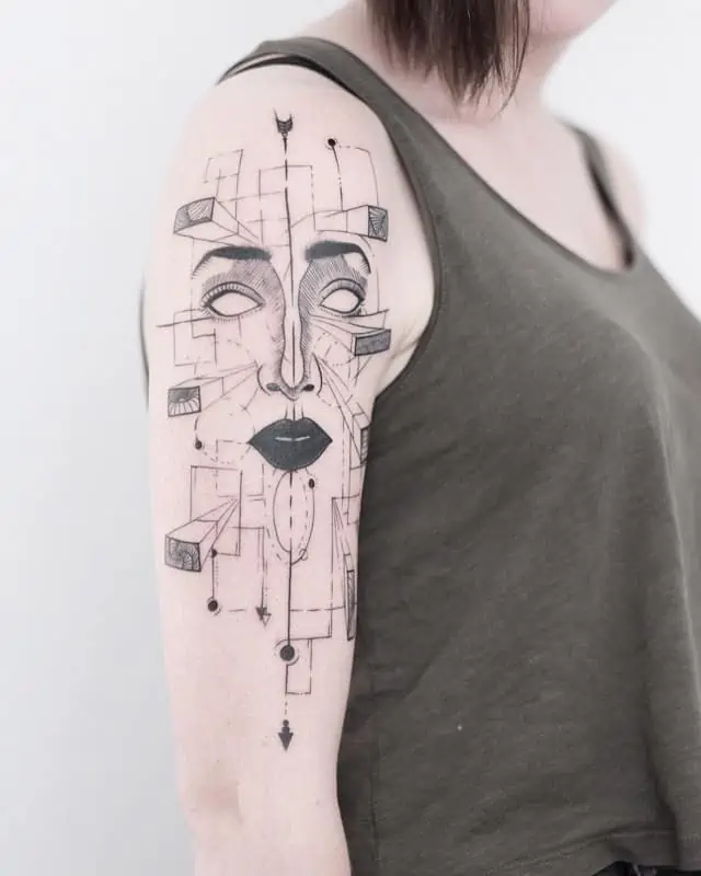 arm face geometric tattoo