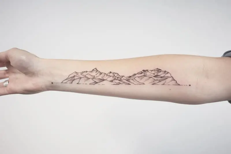 mountain foremarn geometric tattoo