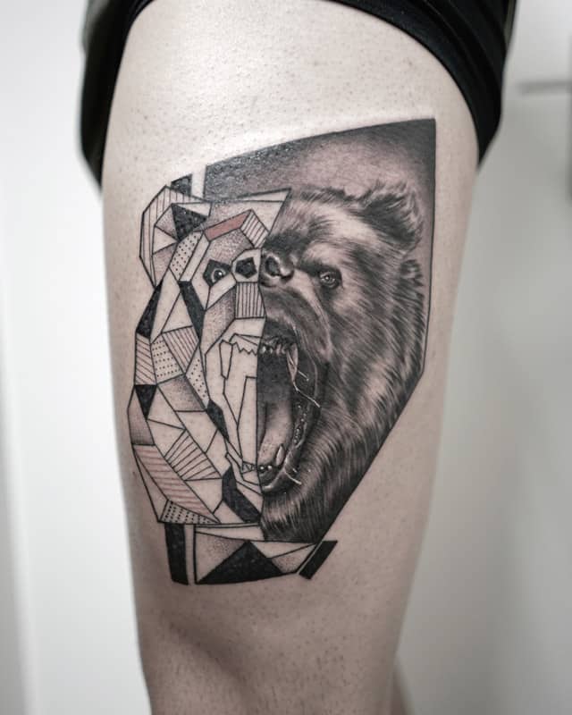bear face thigh geometric tattoo