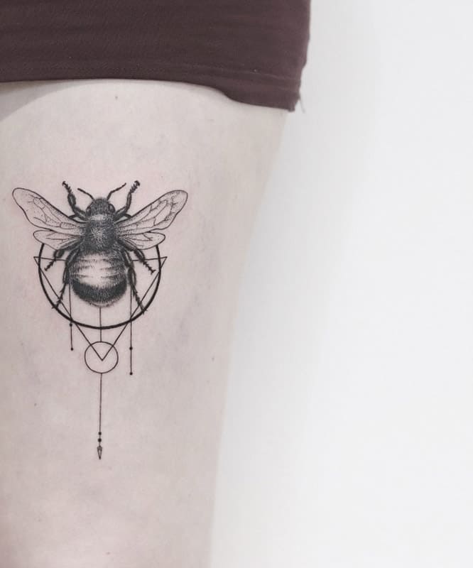 bee thigh geometric tattoo