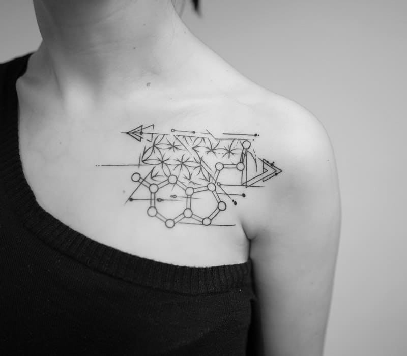 chest custom geometric tattoo