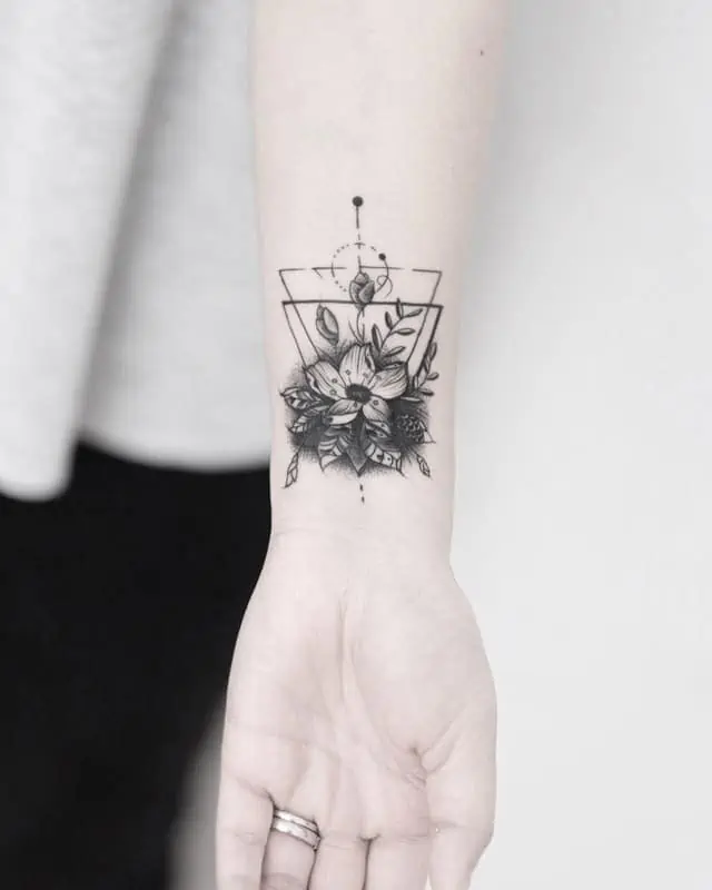 flower wrist geometric tattoo