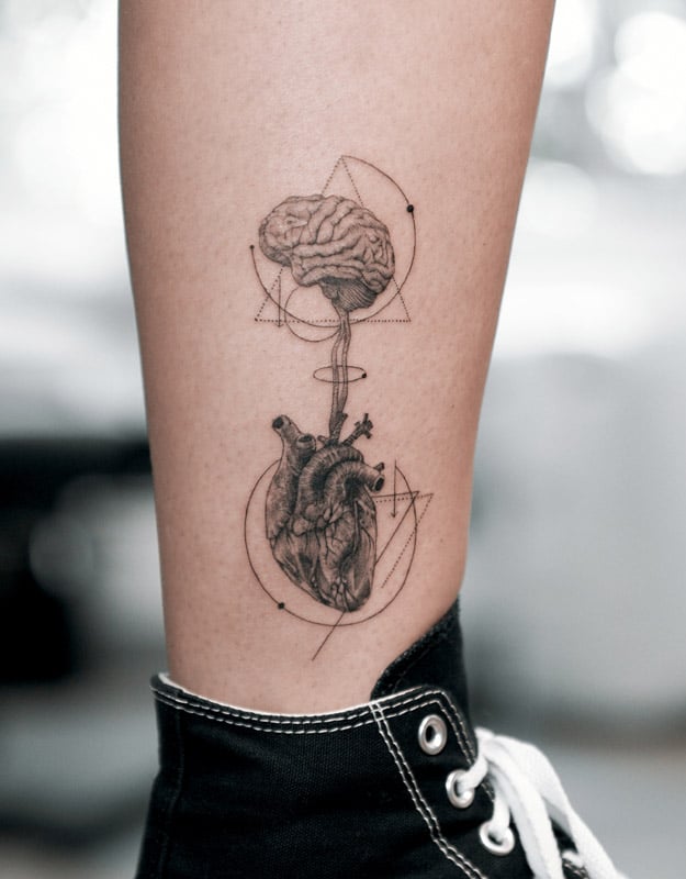 brain and heart leg geometric tattoo