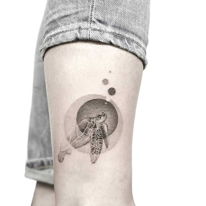 turtle with circles geometric tattoo
