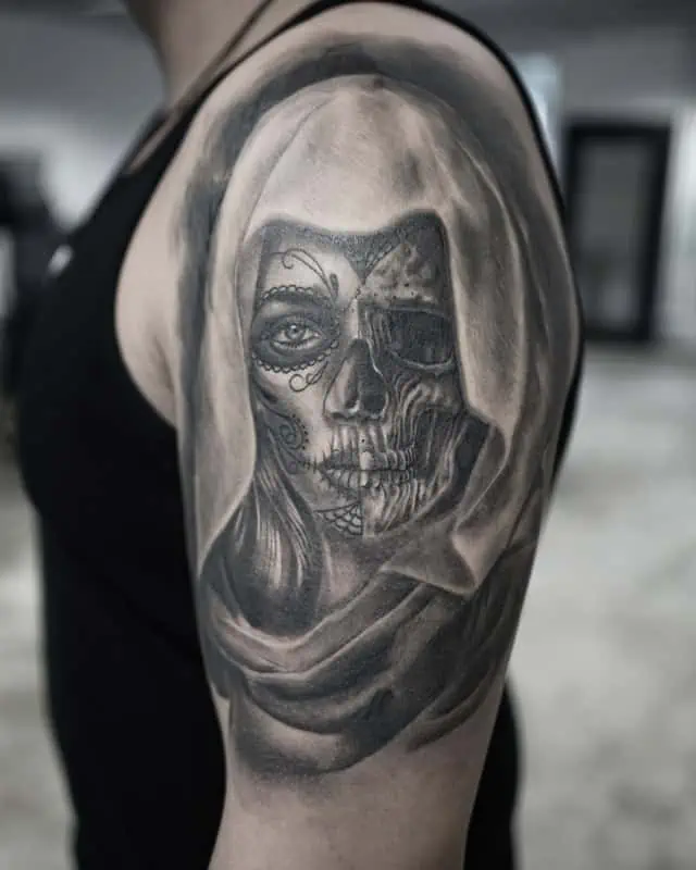 half flesh and half skull head tattoo