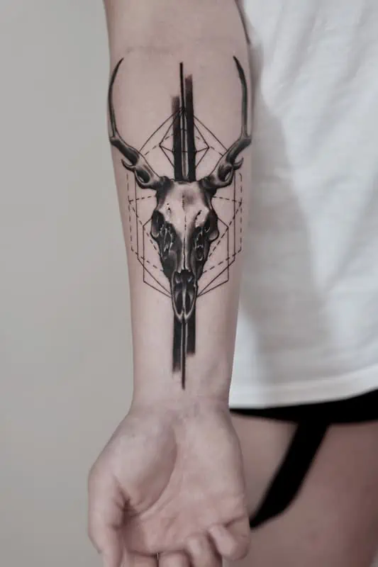 deer skull forearm tattoo realistic