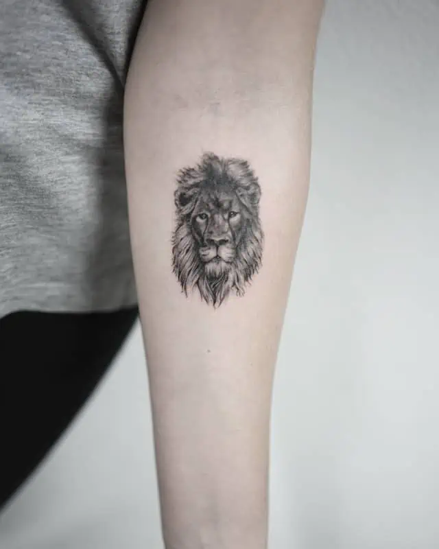 small lion tattoo forearm tattoo