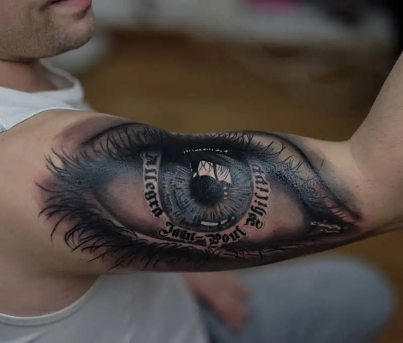 big eye tattoo realistic on arm