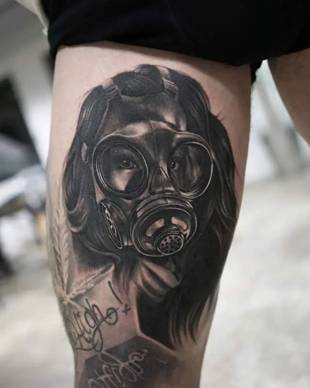 girl wearing facemask tattoo
