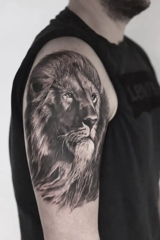 lion arm realistic tattoo